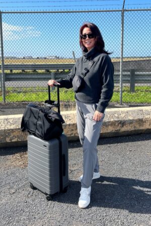 Grey pull up pants and black mock funnel crop fleece