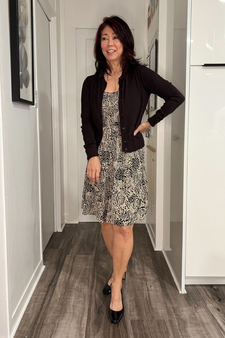 dark brown and cream print ruffled dress with cardigan and slingback sandals