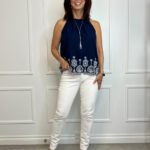 dainty summer work outfit in navy with eyelit trim